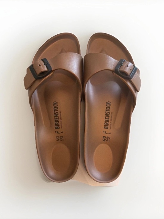 Birkenstock Shoes - Birkenstock brown single-strap EVA slide with black buckle